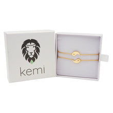 Load image into Gallery viewer, Gold bracelet in a 'kemi' branded box on a white background
