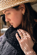 Load image into Gallery viewer, model wearing serpent earrings