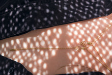 Load image into Gallery viewer, Serpent lariat shown in shadows