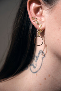 Serpent earrings on model