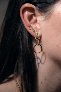 serpent studs with hoop on model