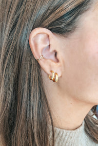 faux double hoops shown on ear