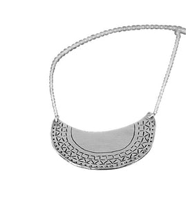 half moon shaped necklace  with tribal pattern around edge